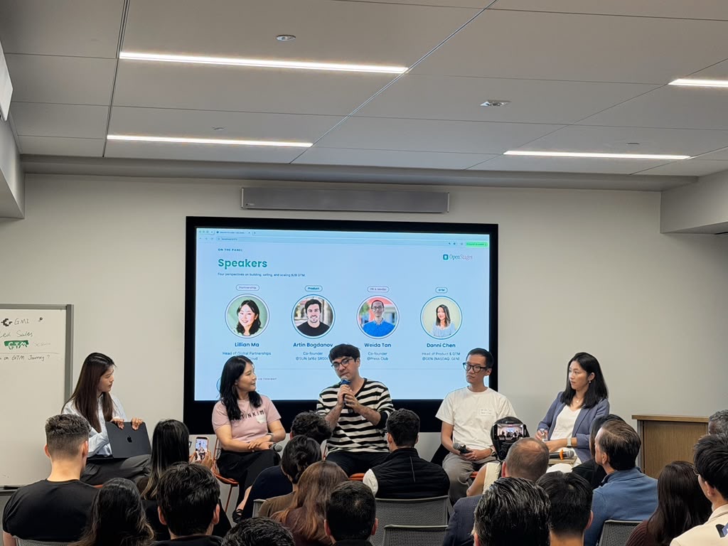 Panelists on stage in front of a full room at the OpenStages founder-led sales GTM session in San Francisco