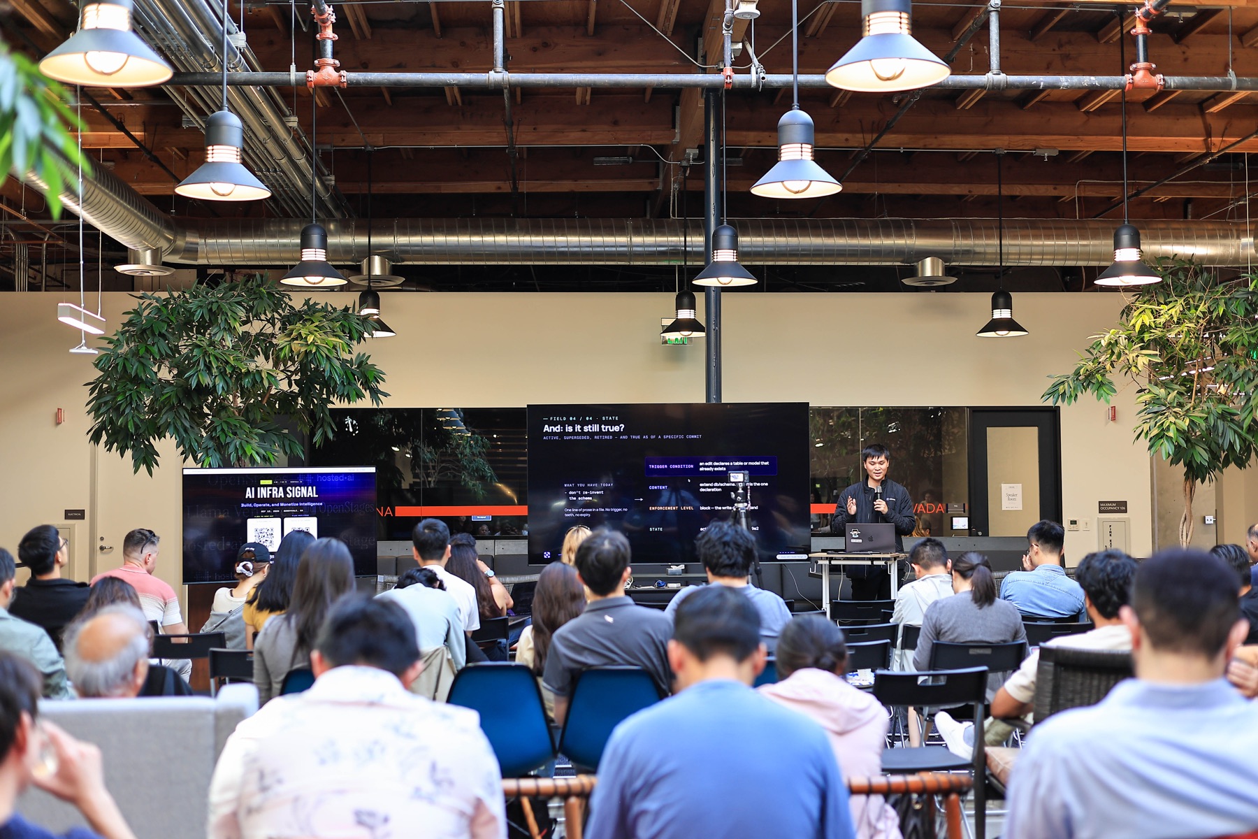 Audience listening to a technical presentation at AI Infra Signal in Sunnyvale